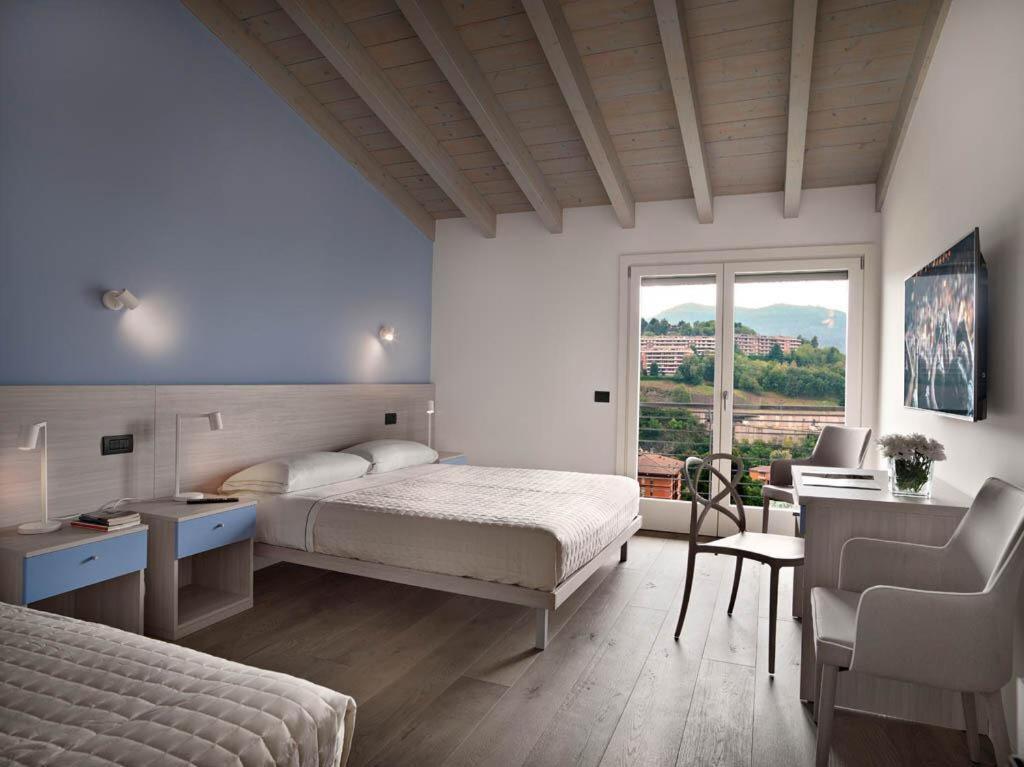 Residence Caffe Maya Maslianico Екстер'єр фото