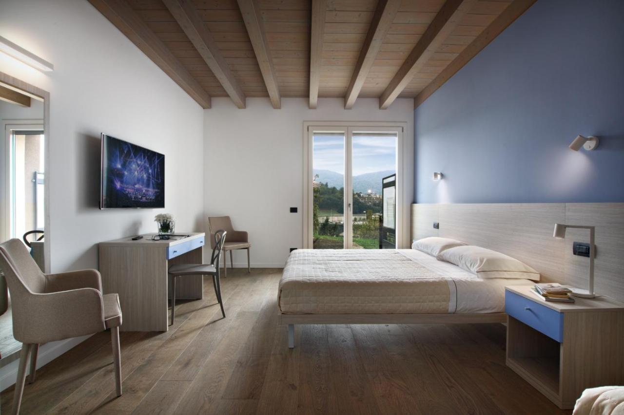 Residence Caffe Maya Maslianico Екстер'єр фото