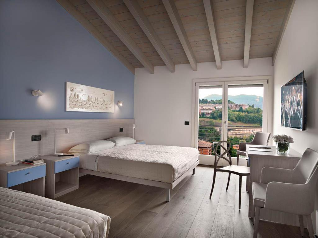 Residence Caffe Maya Maslianico Екстер'єр фото
