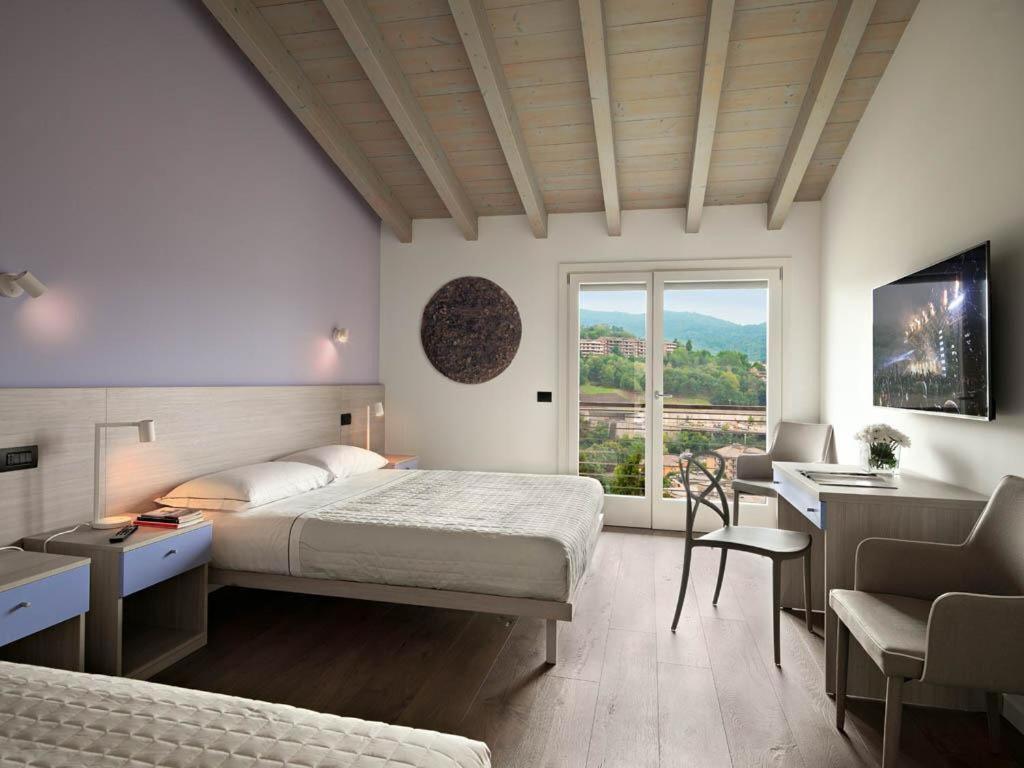 Residence Caffe Maya Maslianico Екстер'єр фото